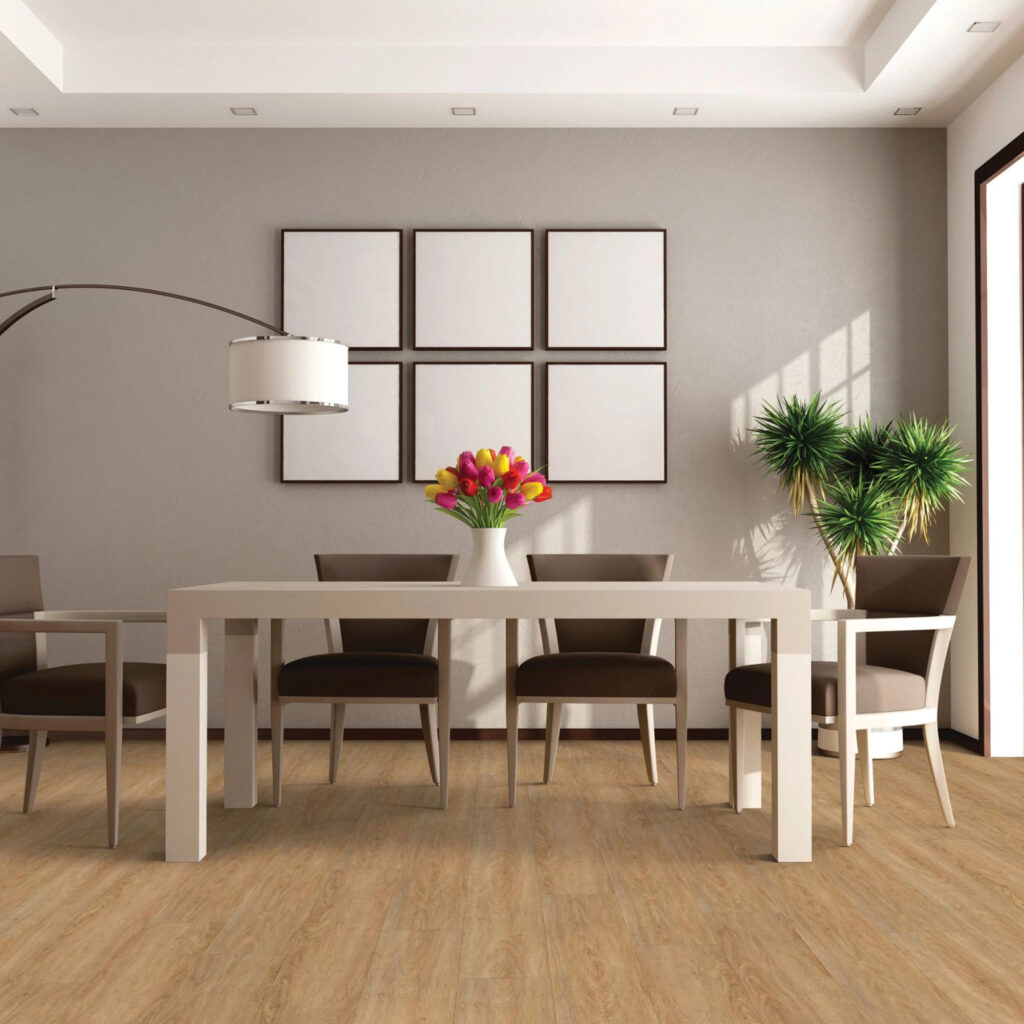 Englewood Floors and More luxury vinyl flooring in a dining room with a white table and a vase with flowers