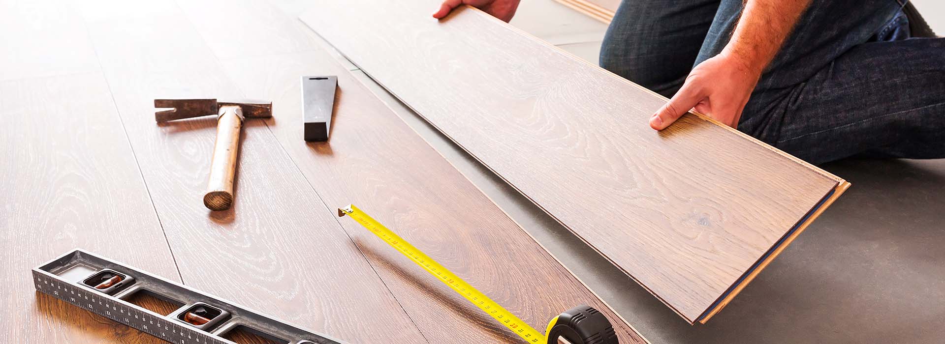 Englewood Floors and more - team member installing new luxury vinyl floors