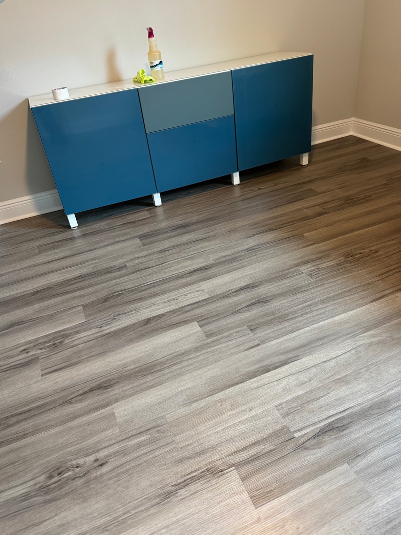 modern credenza on Ashton Woods Oak COREtec Luxury Vinyl flooring