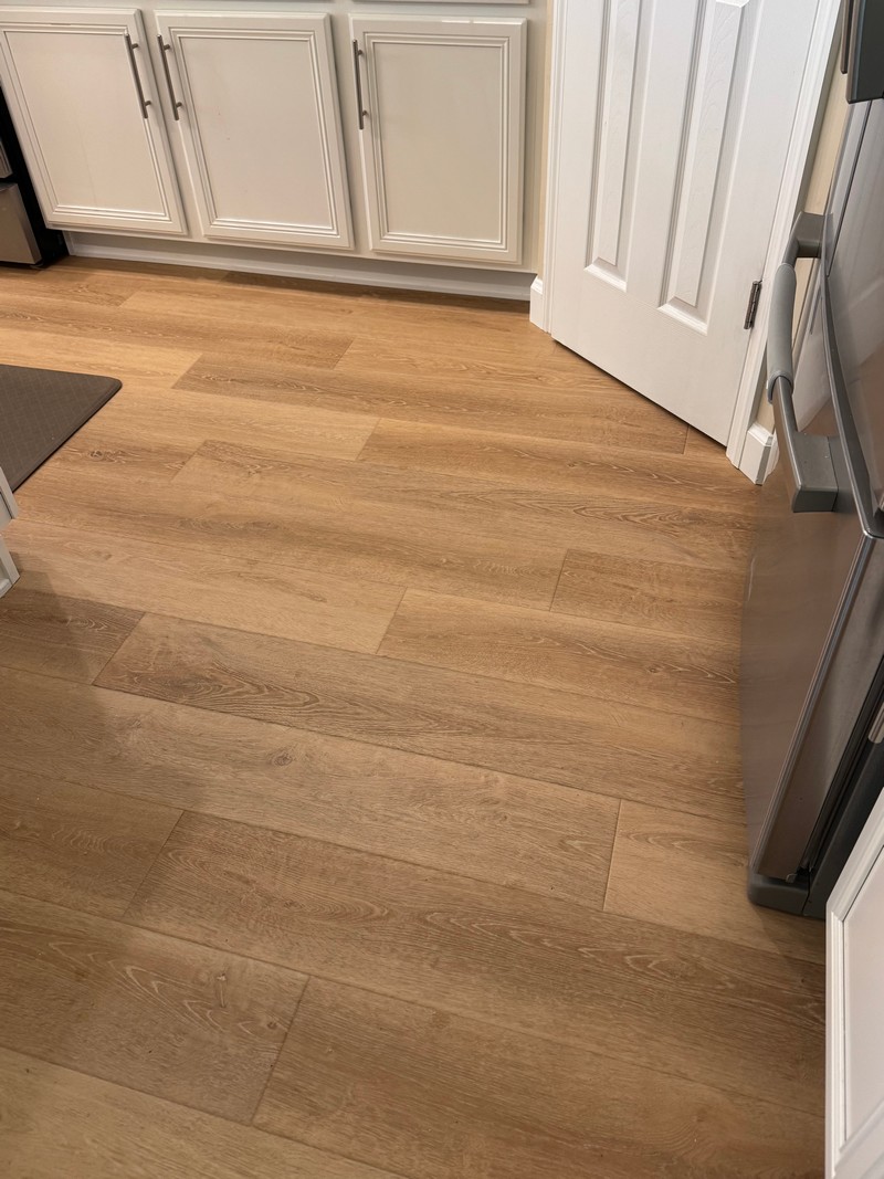 Wheat Oak COREtec Luxury Vinyl flooring in a kitchen