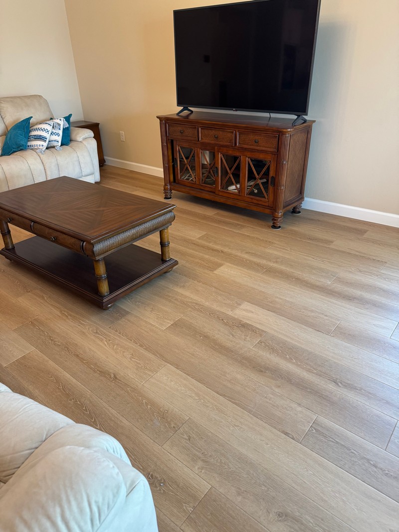 Wheat Oak COREtec Luxury Vinyl flooring in a living room