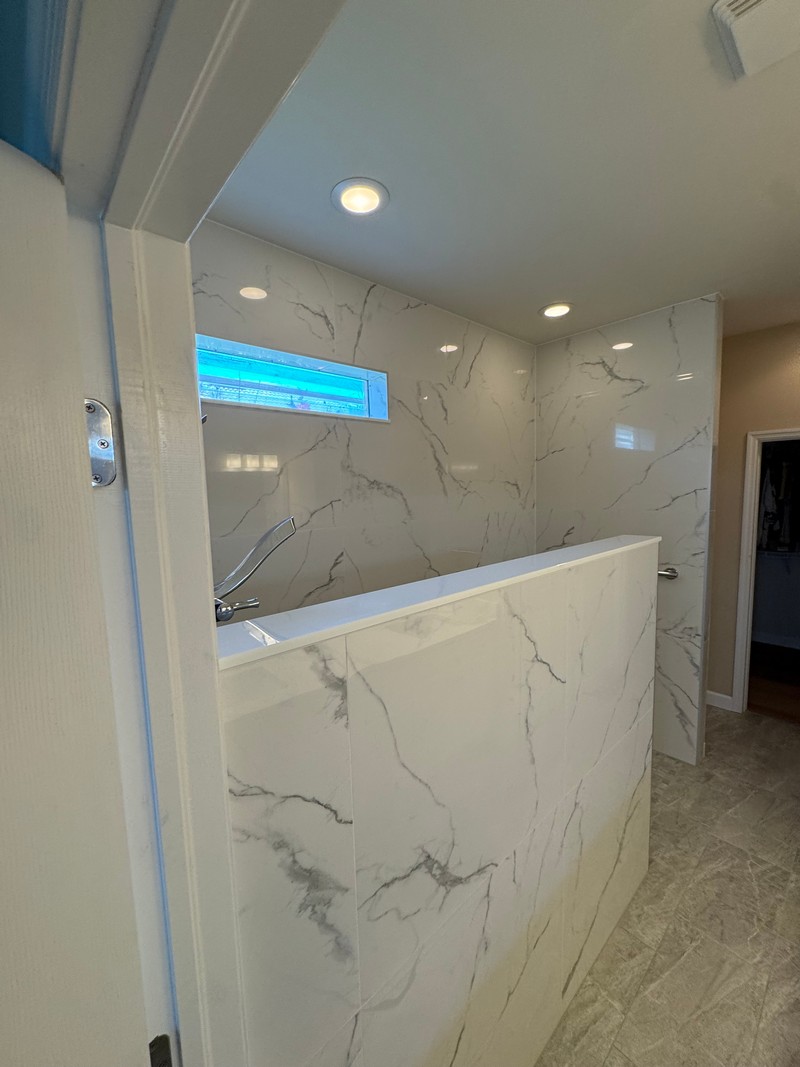 smooth marble tile in a walk-in shower